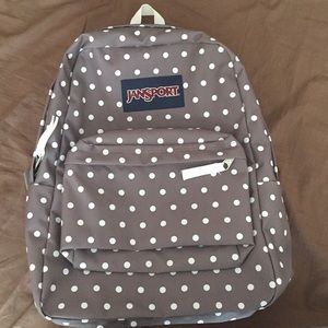 Jansport gray and white polka dot back pack